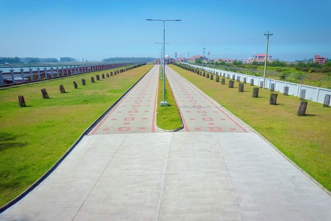 Construction of Road & Walkway and Storm & Waste Water Drainage 