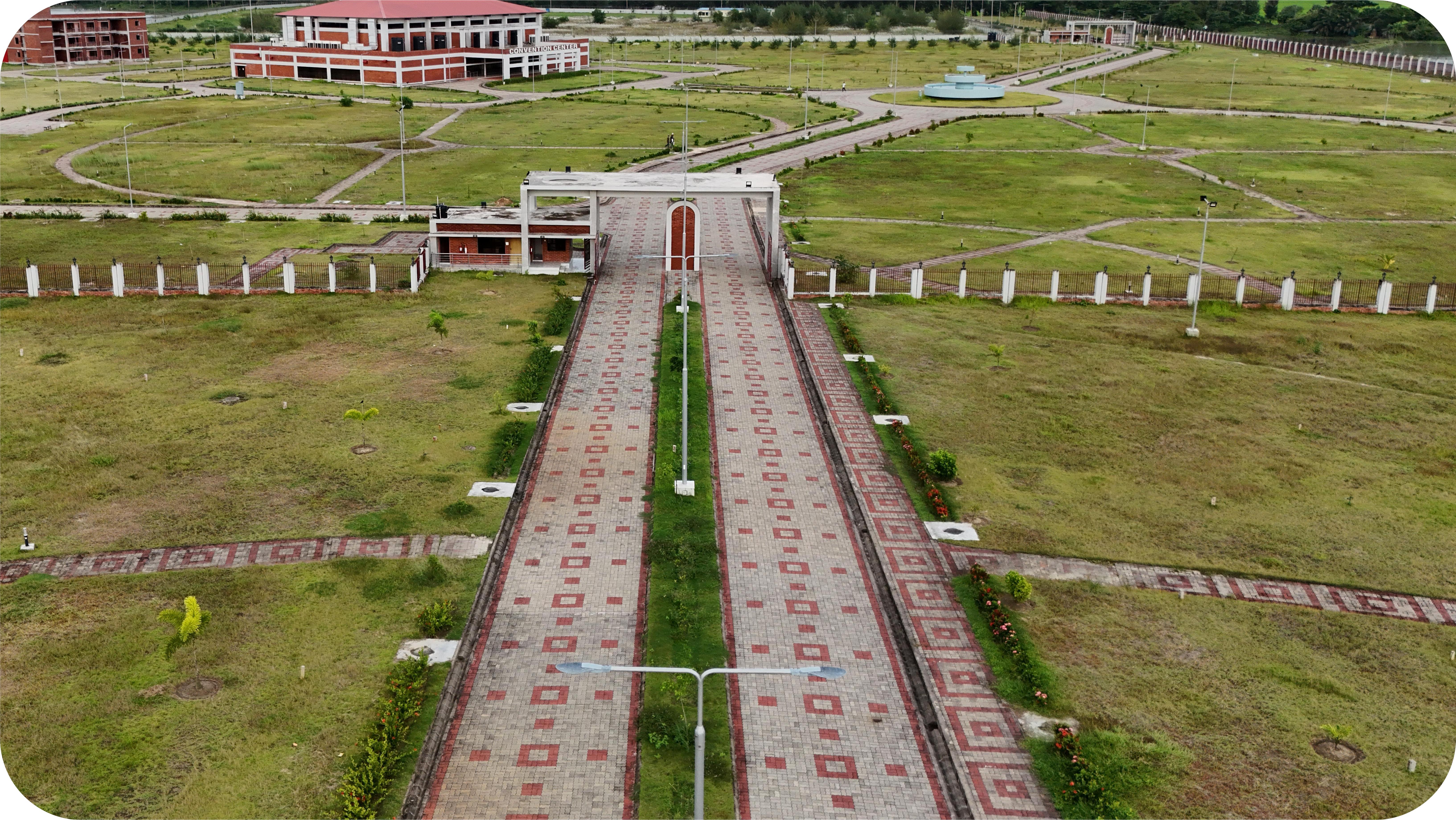 Construction of Road & Walkway and Storm & Waste Water Drainage